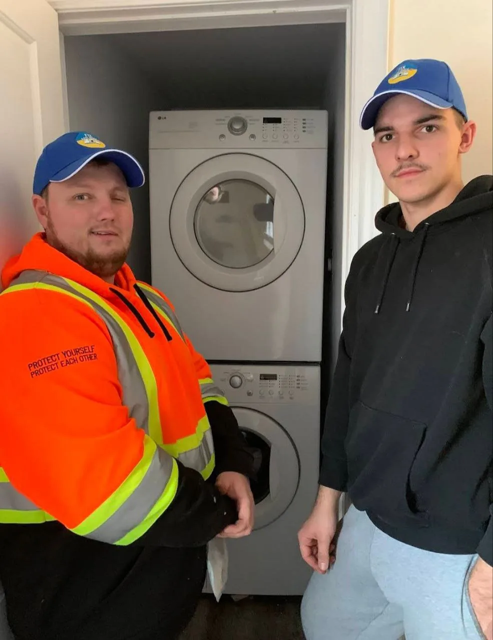 2 washing machine repair technicians repaired the washing machine.